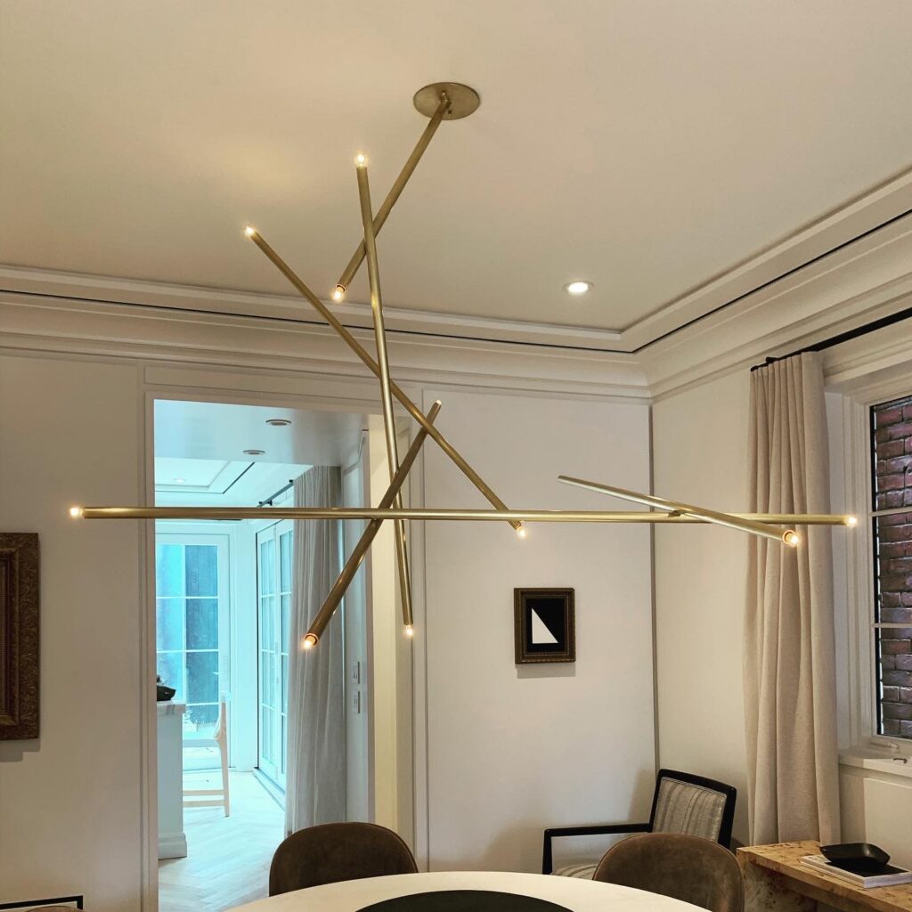 Electric FX sculptural dining room chandelier installation