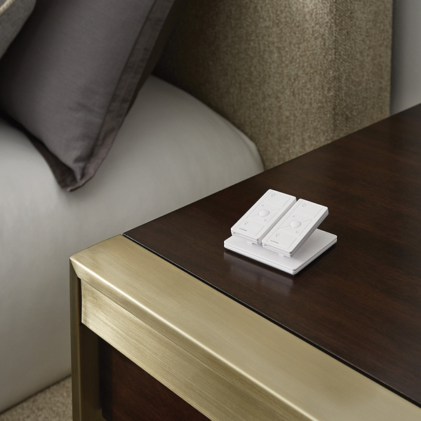 Lutron Pico shade controls on a bedside table
