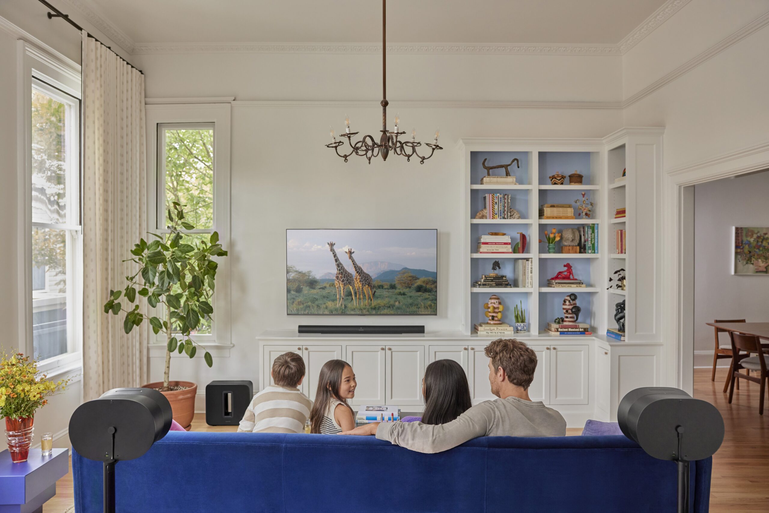 Family enjoying a Sonos home theatre system