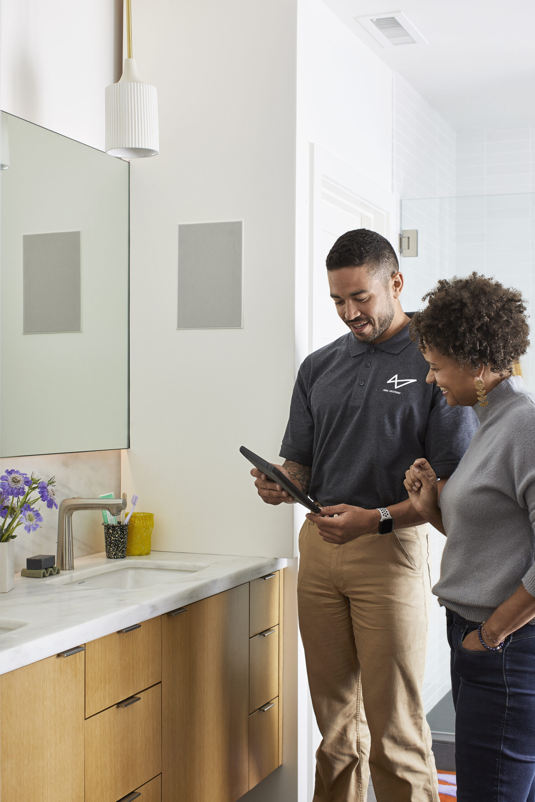 Discreet Sonos audio integrated into a refined bathroom
