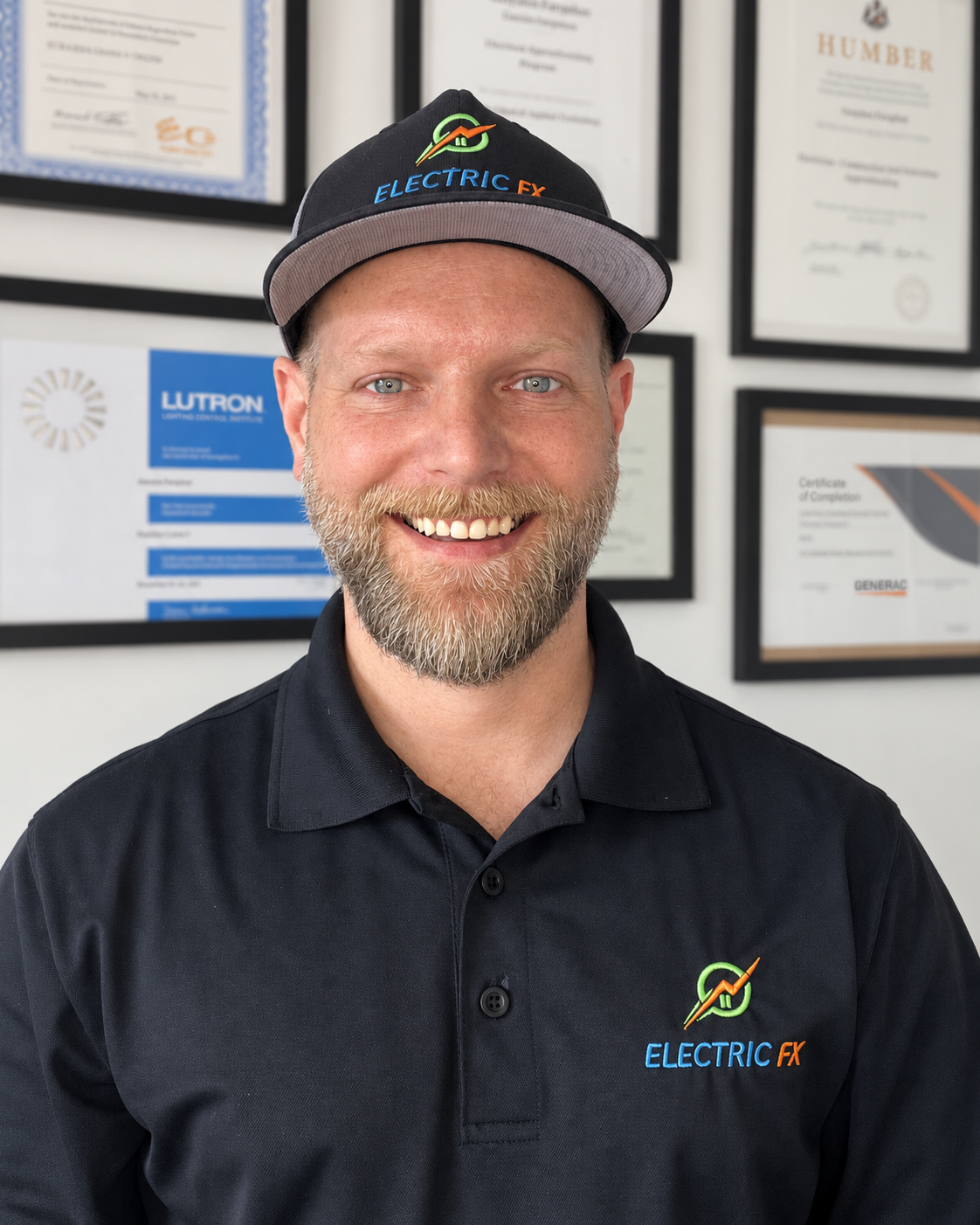 Graydon Farquhar, Master Electrician and Director of Electric FX, wearing his branded polo and cap.