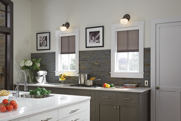 Automated Lutron shades in a refined kitchen