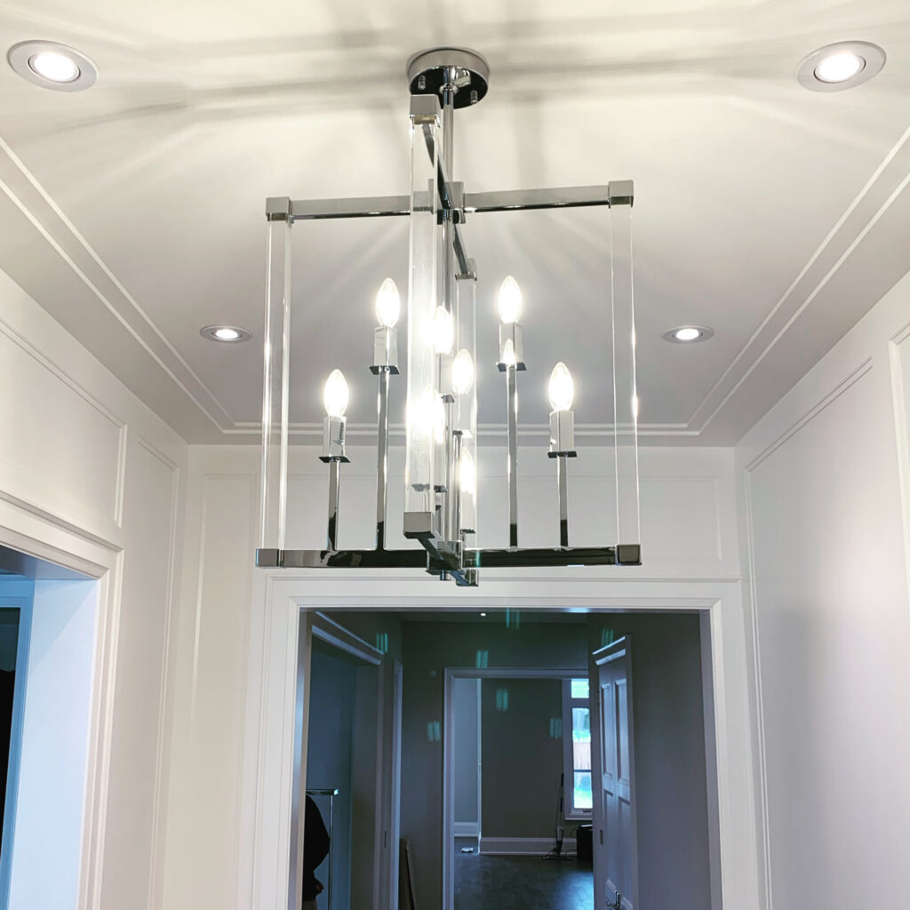 Rectangular lantern chandelier with recessed ceiling lighting
